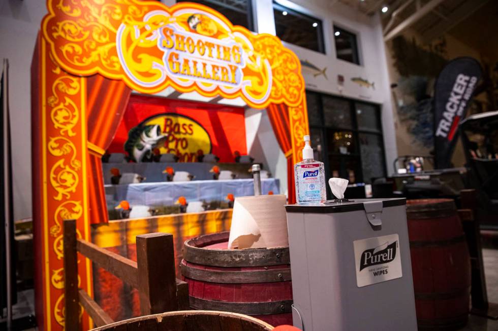 Sanitizater and wipes are seen at a shooting gallery the Santa's Wonderland space at Bass Pro S ...