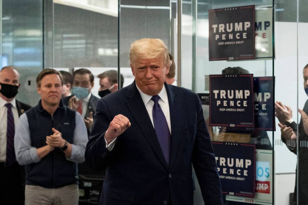 President Donald Trump arrives to speak at the Trump campaign headquarters on Election Day, Tue ...