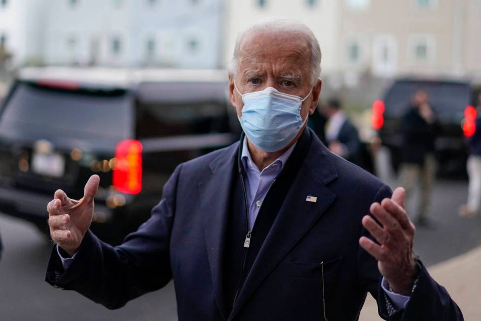 Democratic presidential candidate former Vice President Joe Biden speaks to reporters during a ...