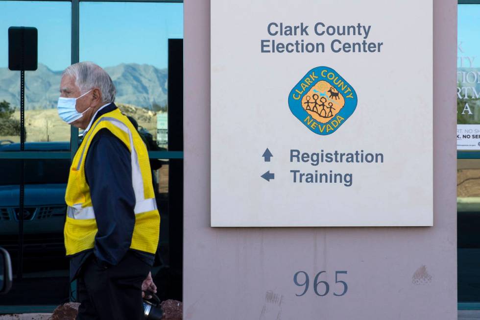 A security guard stands outside of the Clark County Election Center on Wednesday, Nov. 4, 2020, ...