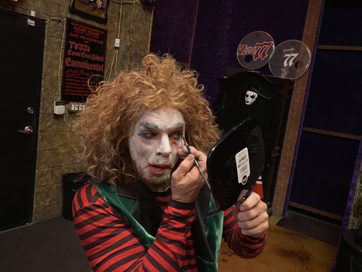 Carrot Top is shown touching up his makeup before recording a heavy metal version of "Send In T ...
