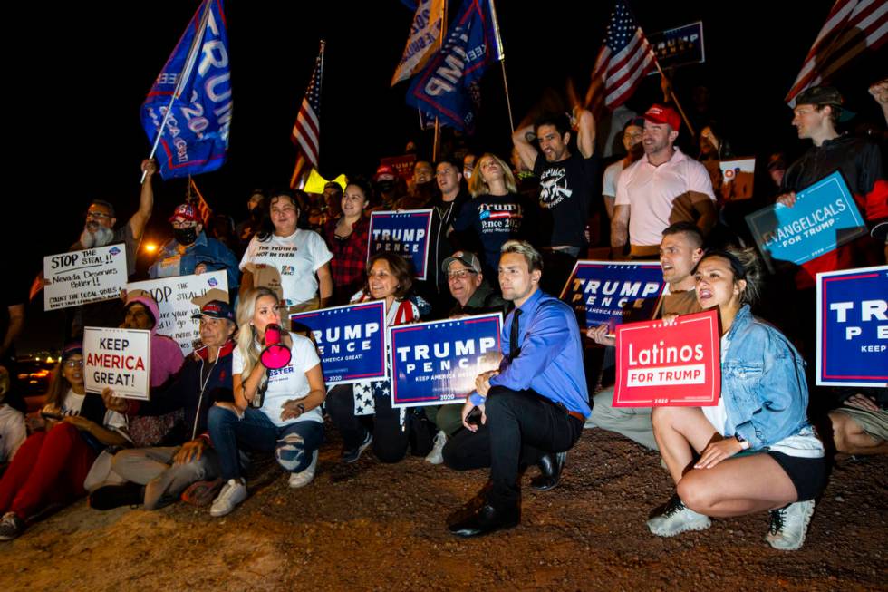 Supporters of President Donald Trump pose for a picture while protesting outside of the Clark C ...