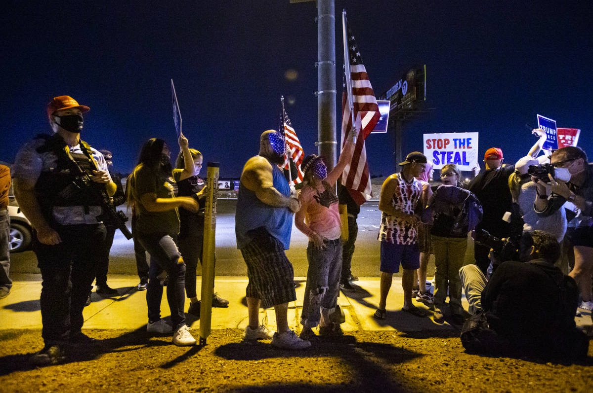 Supporters of President Donald Trump protest outside of the Clark County Election Department bu ...