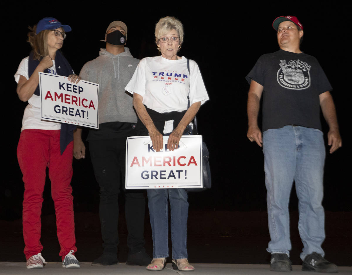 Protesters participate in a Stop the Steal protest at the Clark County Election Department in N ...