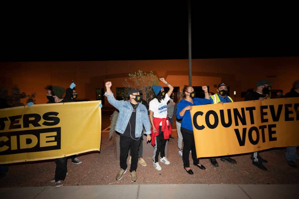 Individuals chant ÒEvery vote counts,Ó at the Clark County Election Department in Nor ...