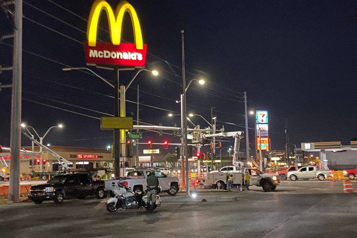 A Las Vegas police officer at a construction zone at Lamb and Charleston boulevards where a con ...