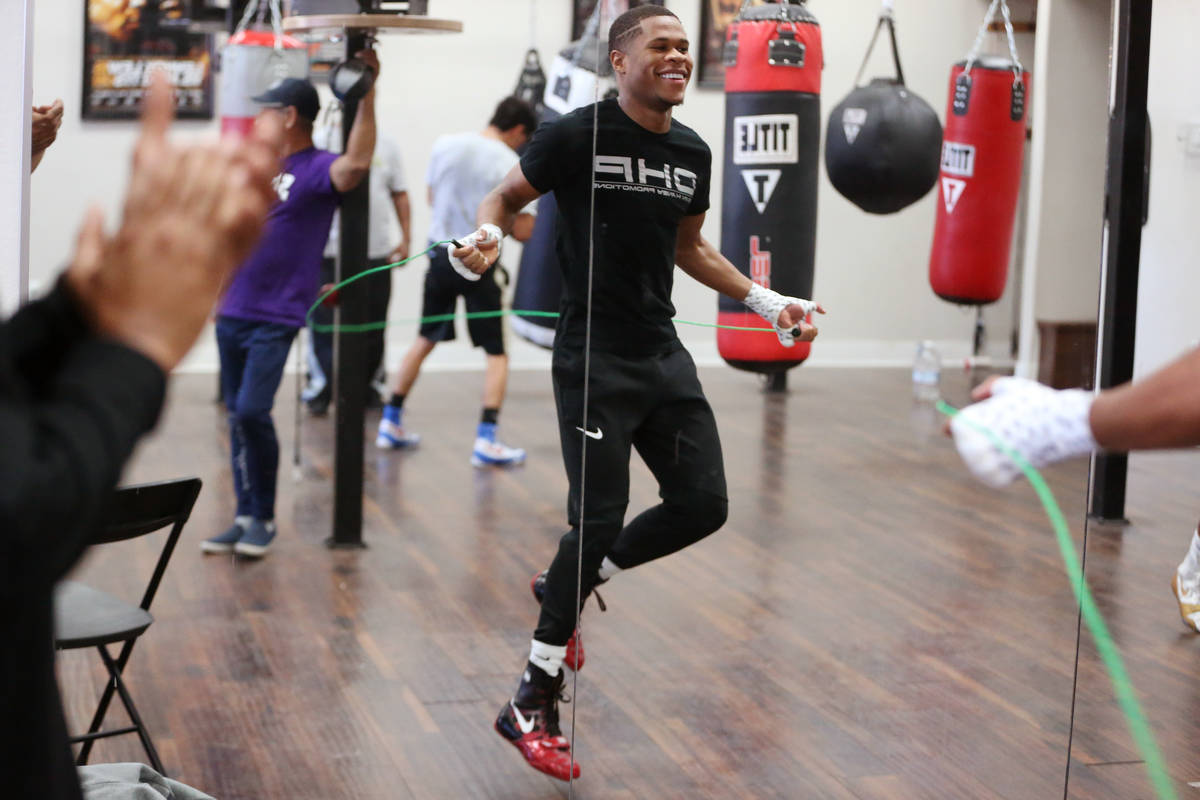 Boxer Devin Haney jumps the rope to warm up during a boxing gym workout at Title Boxing gym in ...