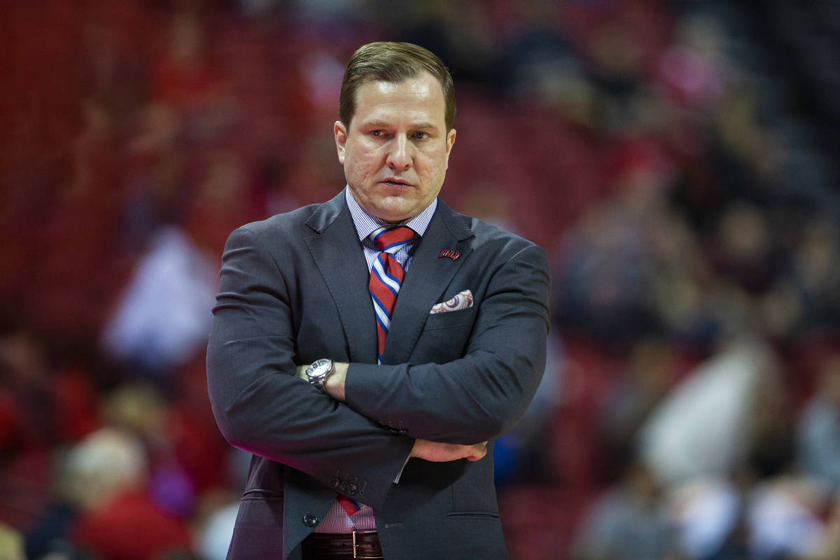 UNLV Rebels head coach T.J. Otzelberger coaches his team in the second half of their NCAA baske ...