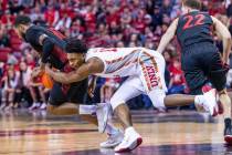 UNLV Rebels guard Bryce Hamilton (13, center) loses the ball late to San Diego State Aztecs for ...