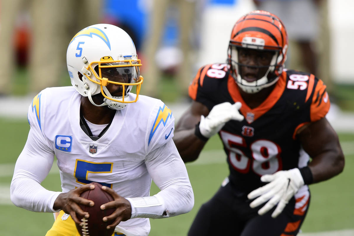 Los Angeles Chargers quarterback Tyrod Taylor (5) runs the ball during an NFL football game aga ...