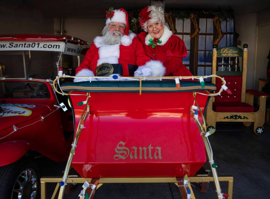Jean Gray, 72, as "Santa Kris Kringle" and Mrs. Claus, are seen at Groeschke's home on Tuesday, ...