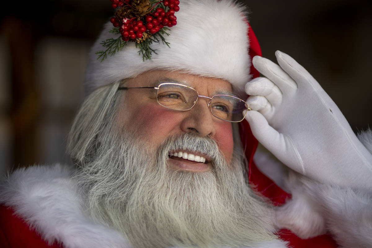 Chris Groeschke, 64, as "Santa Kirs Kringle" is photographed at Groeschke's home on T ...