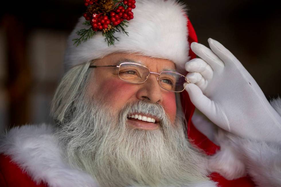 Chris Groeschke, 64, as "Santa Kirs Kringle" is photographed at Groeschke's home on T ...