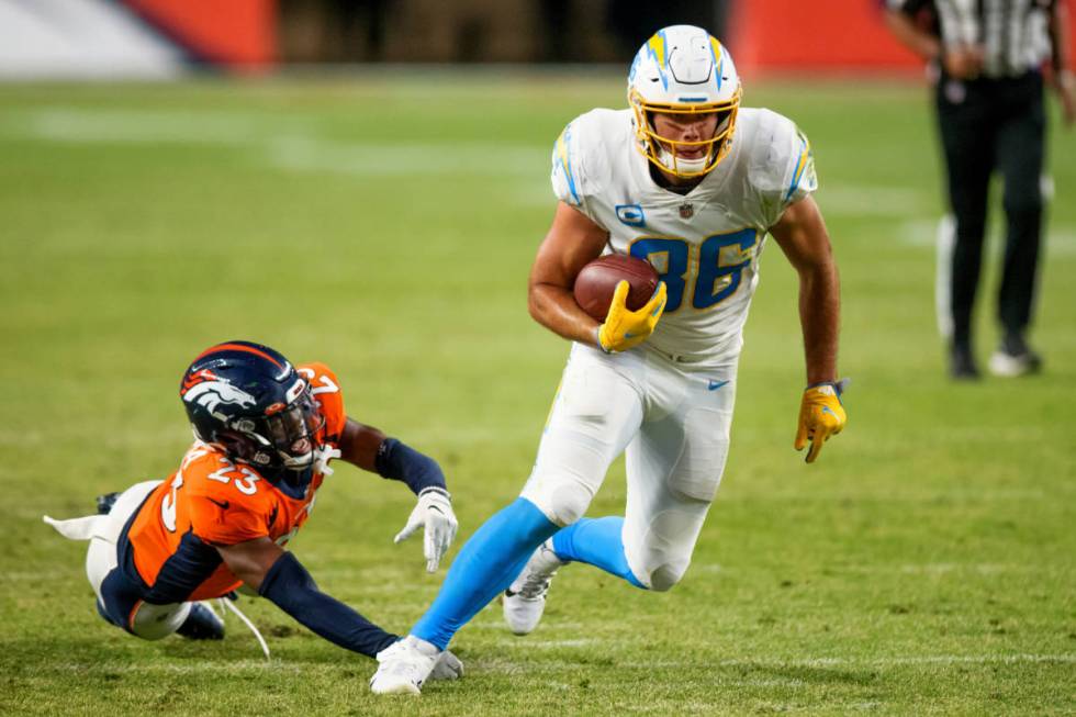 Los Angeles Chargers tight end Hunter Henry (86) runs with the football after catching a pass a ...