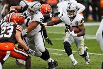 Las Vegas Raiders running back Josh Jacobs (28) rushes during the first half of an NFL football ...