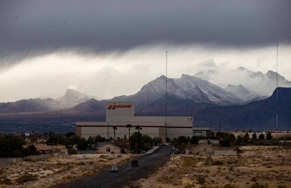 Clouds cover the Spring Mountains and Red Rock Canyon National Conservation Area as rain falls ...