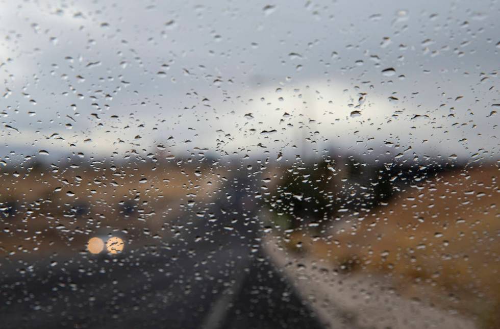 Droplets gather on a windshielf as rain falls in the Las Vegas Valley on Saturday, Nov. 7, 2020 ...