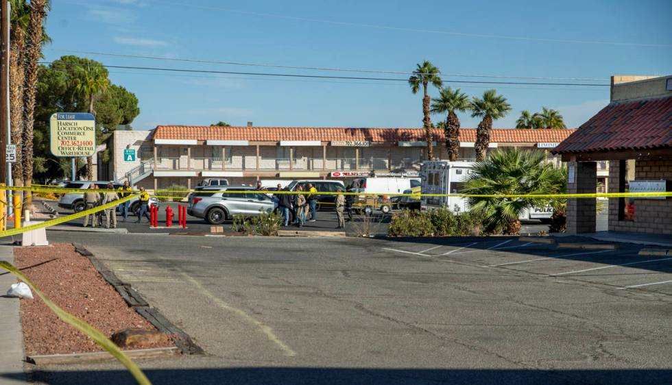 Las Vegas police gather as they investigate a homicide in the central valley near 3280 South Wy ...