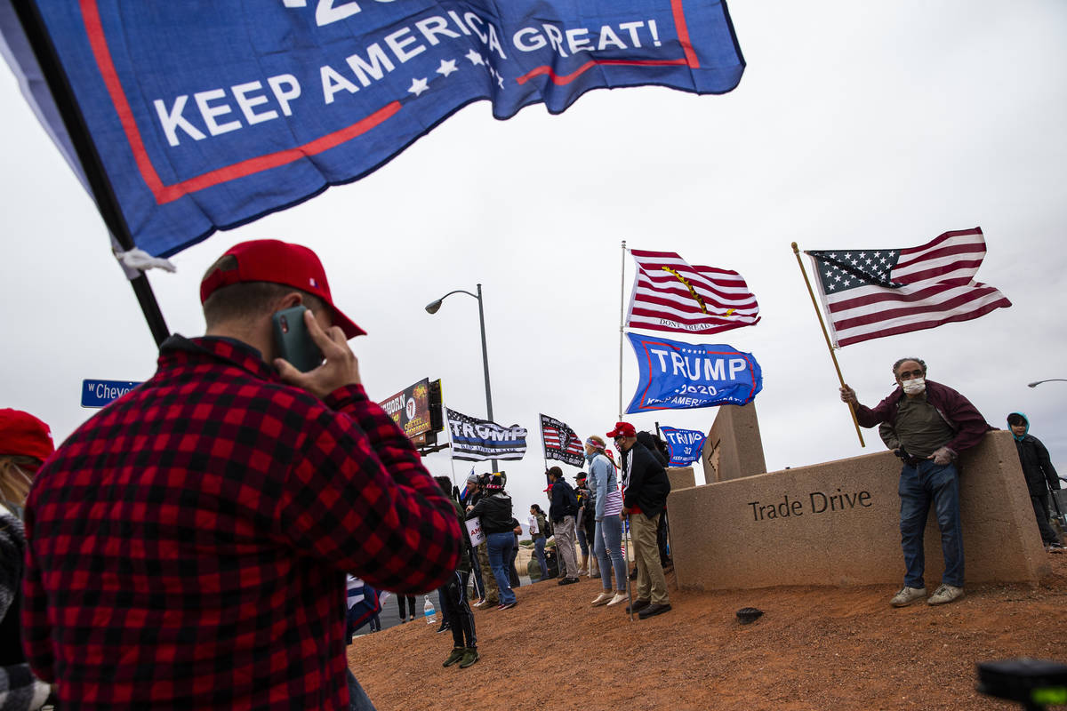 Supporters of President Donald Trump protest outside of the Clark County Election Department af ...