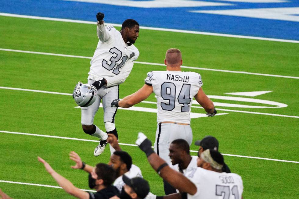 Las Vegas Raiders cornerback Isaiah Johnson (31) celebrates his stop of Los Angeles Chargers ti ...