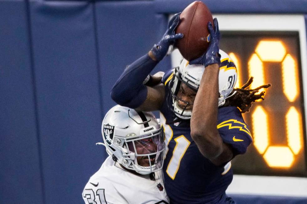 Las Vegas Raiders cornerback Isaiah Johnson (31) breaks up a pass attempt in the end zone from ...