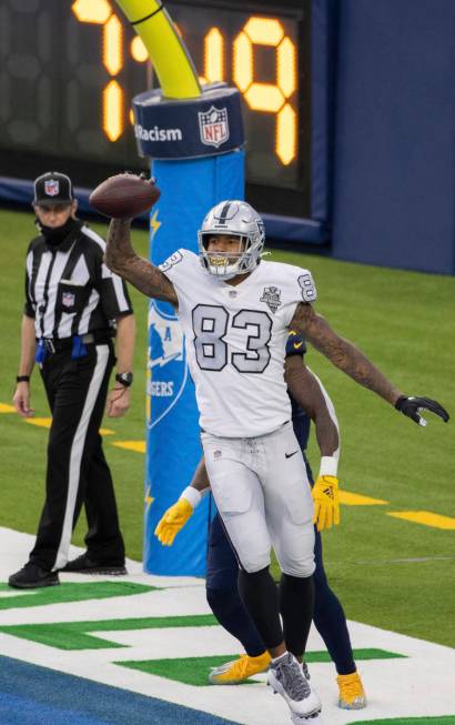 Las Vegas Raiders tight end Darren Waller (83) celebrates after catching a touchdown pass in th ...