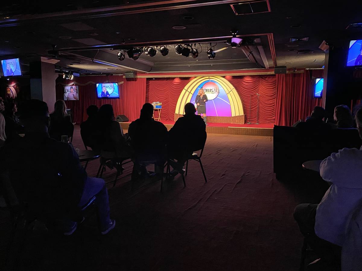 Veteran comic Traci Skene is shown onstage for a socially distant audience at Laugh Factory at ...