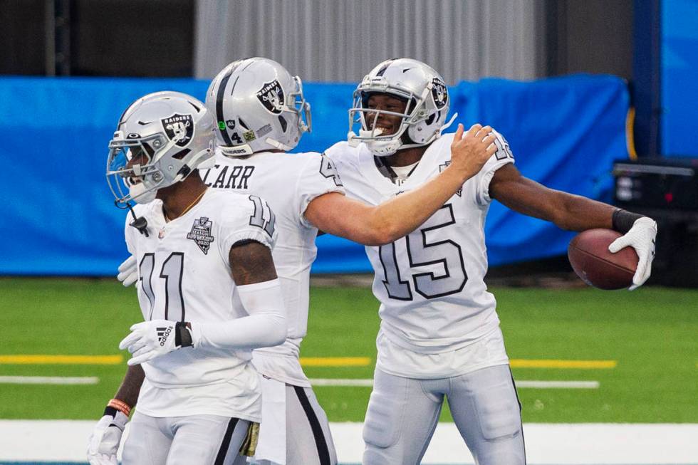 Las Vegas Raiders wide receiver Nelson Agholor (15) celebrates his touchdown score with quarter ...