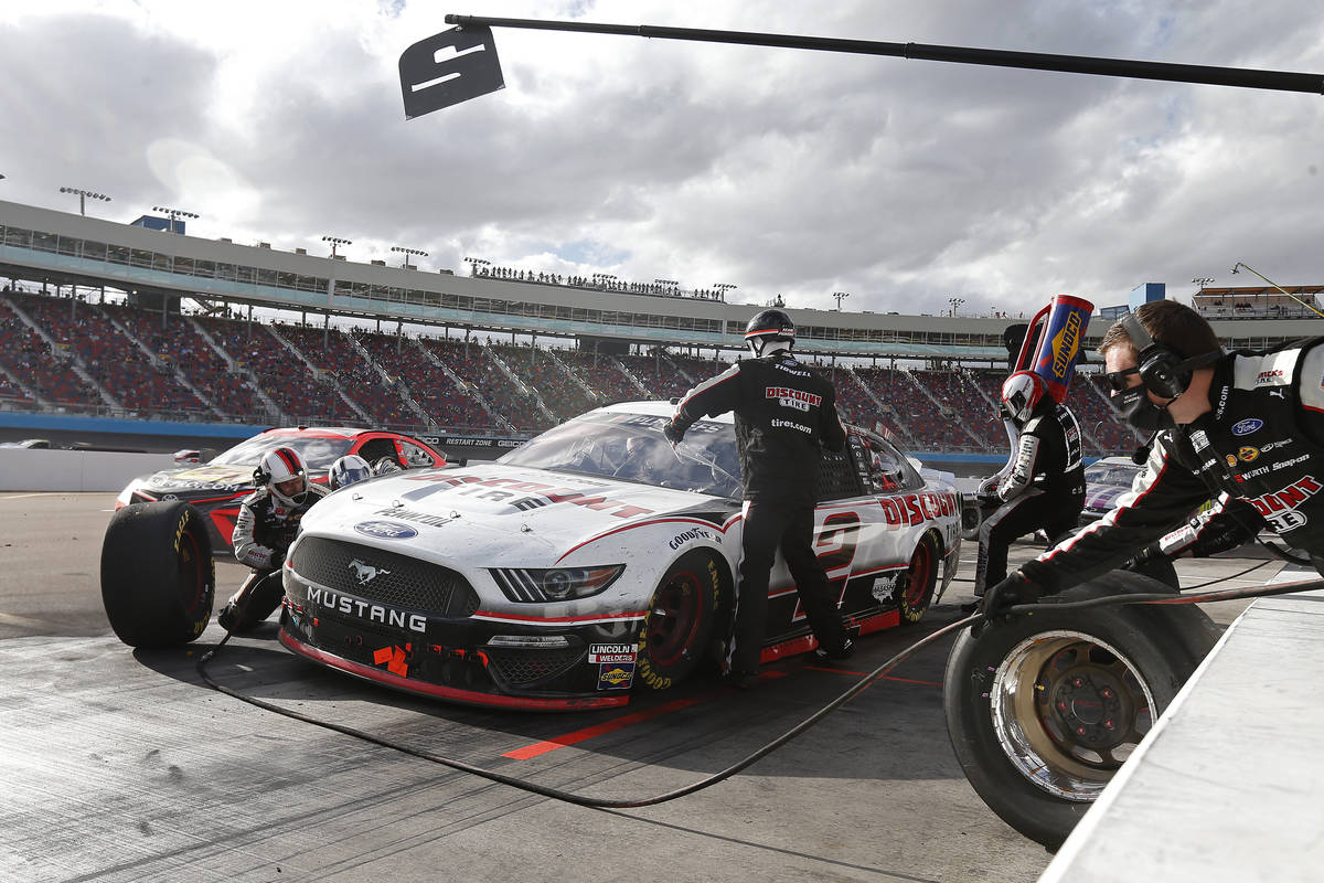 Brad Keselowski (2) makes a pit stop for tires and fuel on lap 196 during a NASCAR Cup Series a ...