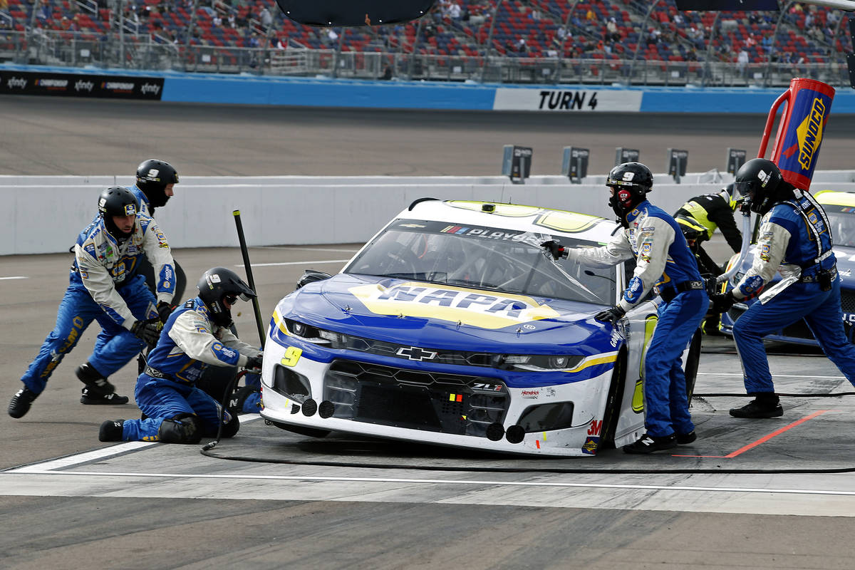 Chase Elliott (9) makes a pit stop for tires and fuel during the NASCAR Cup Series auto race at ...