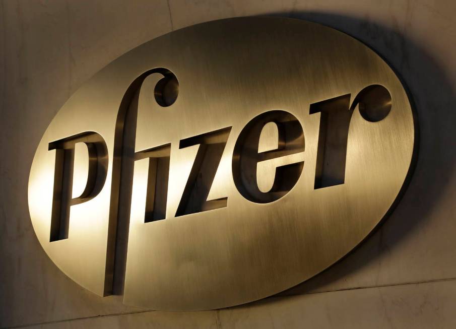 FILE - In this Monday, Nov. 23, 2015, file photo, the Pfizer logo is displayed at world headqua ...