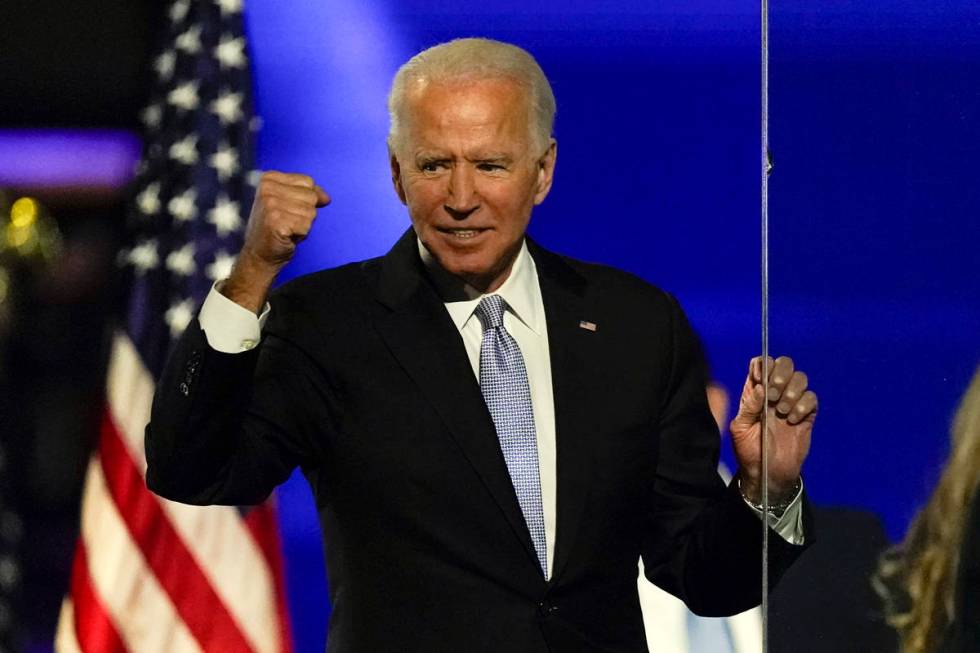 President-elect Joe Biden gestures to supporters Saturday, Nov. 7, 2020, in Wilmington, Del. (A ...