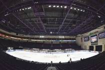 Skaters warm up before the ice dance free dance program in the International Skating Union Gran ...