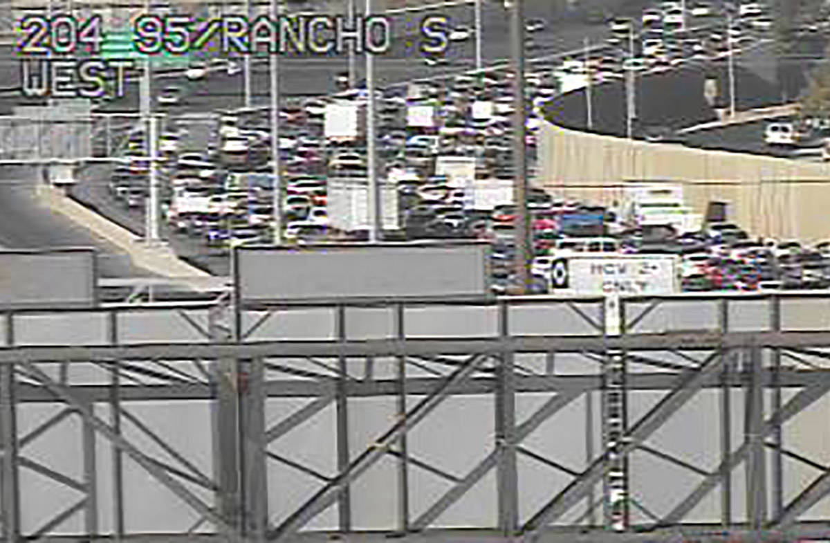 Northbound U.S. 95 traffic is snarled as it leaves the Spaghetti Bowl near Rancho Drive about 8 ...