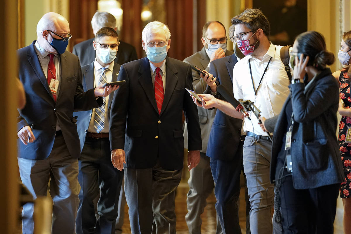 Senate Majority Leader Mitch McConnell of Ky., talks with reporters after he spoke on the Senat ...