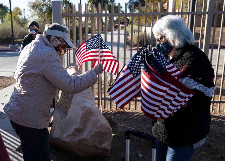 Muriel Scrivner, left, retired U.S. Air Force Sgt., and Korean War veteran, and Mary Castro, pl ...