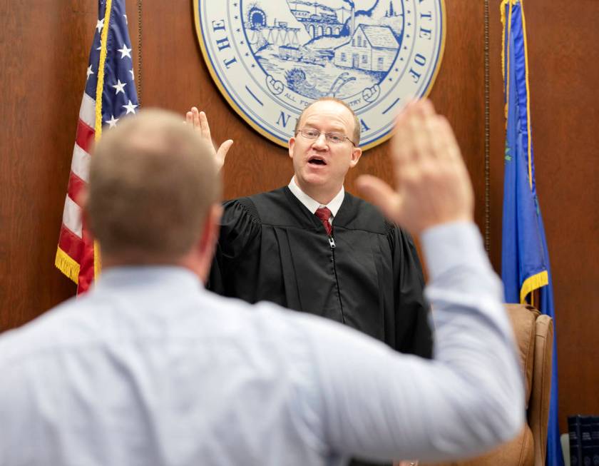 Ely Justice of the Peace Mason Simons swears in White Pine County Sheriff’s Office Detective ...