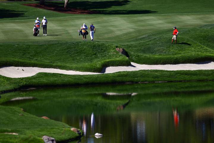 Golf players wait to head to the fourth green during the third round of the CJ Cup at the Shado ...