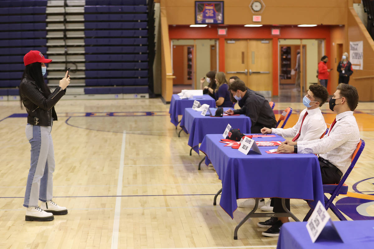 Santino Panaro, left, and Gavin Mez, are photographed during a Signing Day ceremony at Bishop G ...