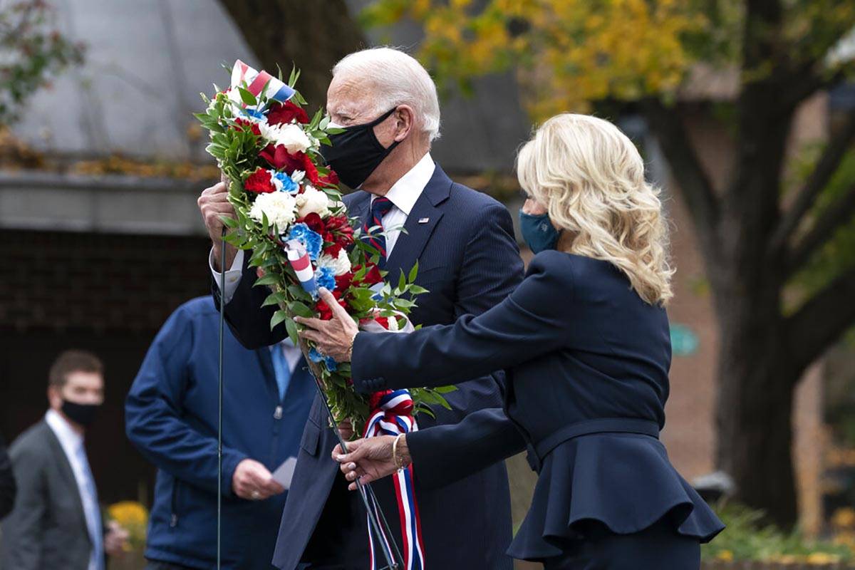 President-elect Joe Biden, and Jill Biden, place a wreath at the Philadelphia Korean War Memori ...