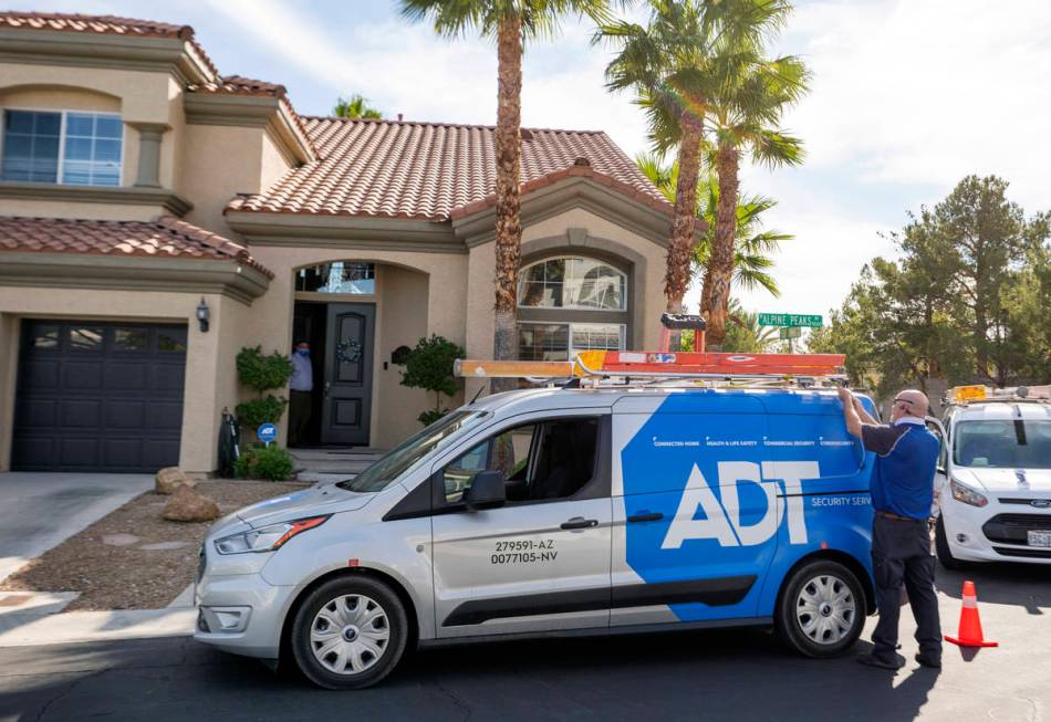 ADT Custom Home Services technician Paul Keplinger arrives at a home in Las Vegas on Nov. 5, 20 ...