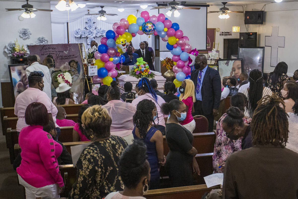Family and friends gather inside the chapel for the funeral service for Sayah Deal at the Tried ...