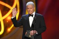 FILE - This May 5, 2019, file photo shows Alex Trebek gestures while presenting an award at the ...