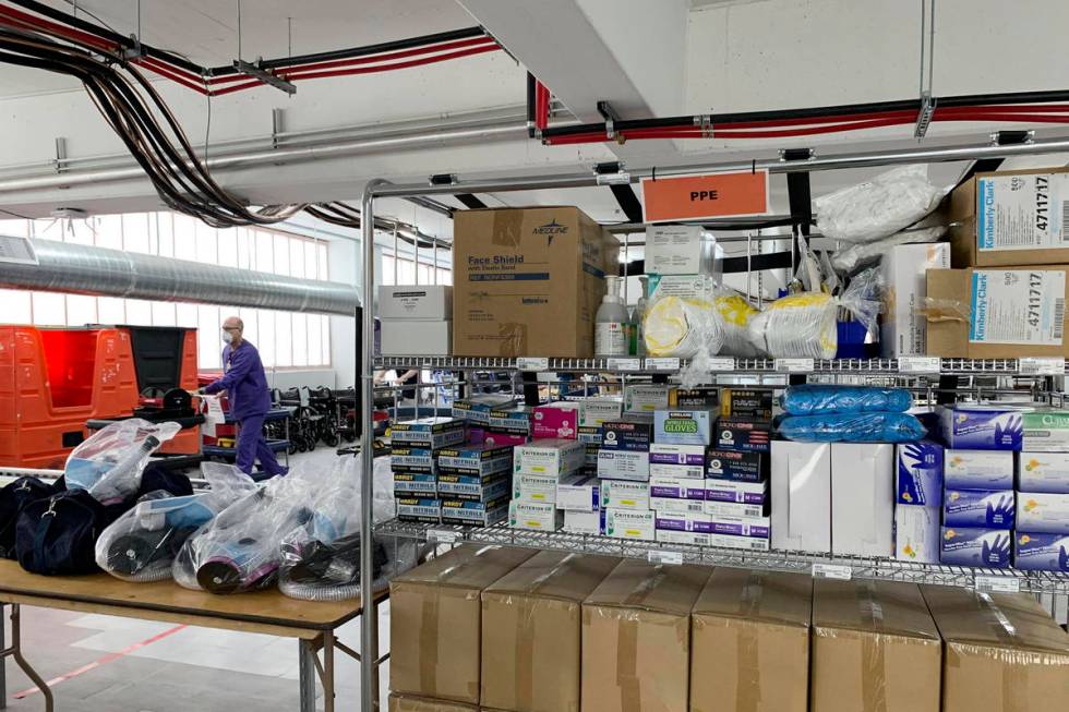 Personal protective equipment (PPE) is stacked inside Renown Regional Medical Center's parking ...
