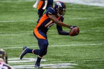 Denver Broncos wide receiver Jerry Jeudy (10) catches a pass during the second half of an NFL f ...