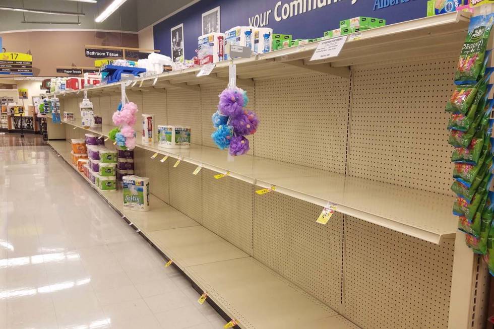 Nearly empty paper-products shelves at a Las Vegas Albertsons store. (Heidi Knapp Rinella)