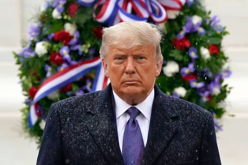 President Donald Trump participates in a Veterans Day wreath laying ceremony at the Tomb of the ...