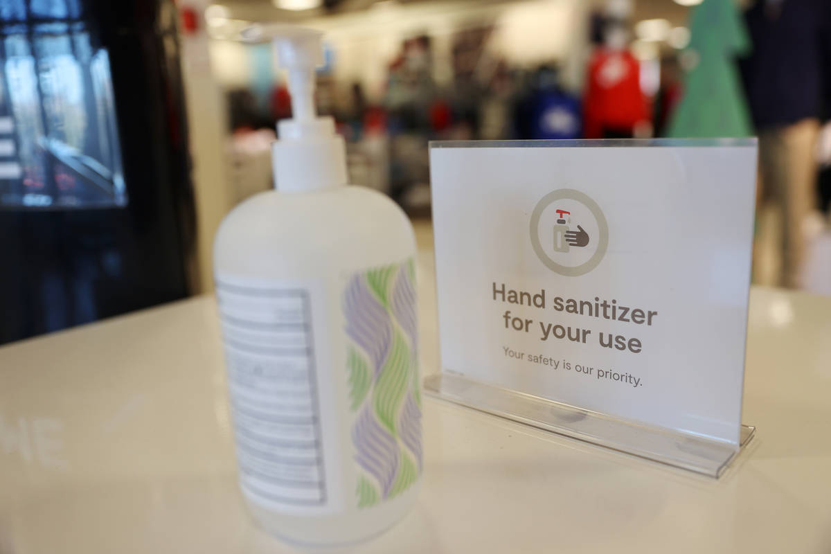 Hand sanitizer is available for guests at the entrance to J. C. Penney, 4485 S Grand Canyon, in ...
