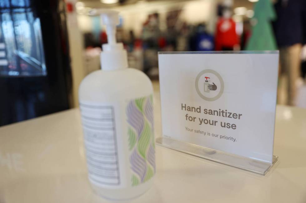 Hand sanitizer is available for guests at the entrance to J. C. Penney, 4485 S Grand Canyon, in ...