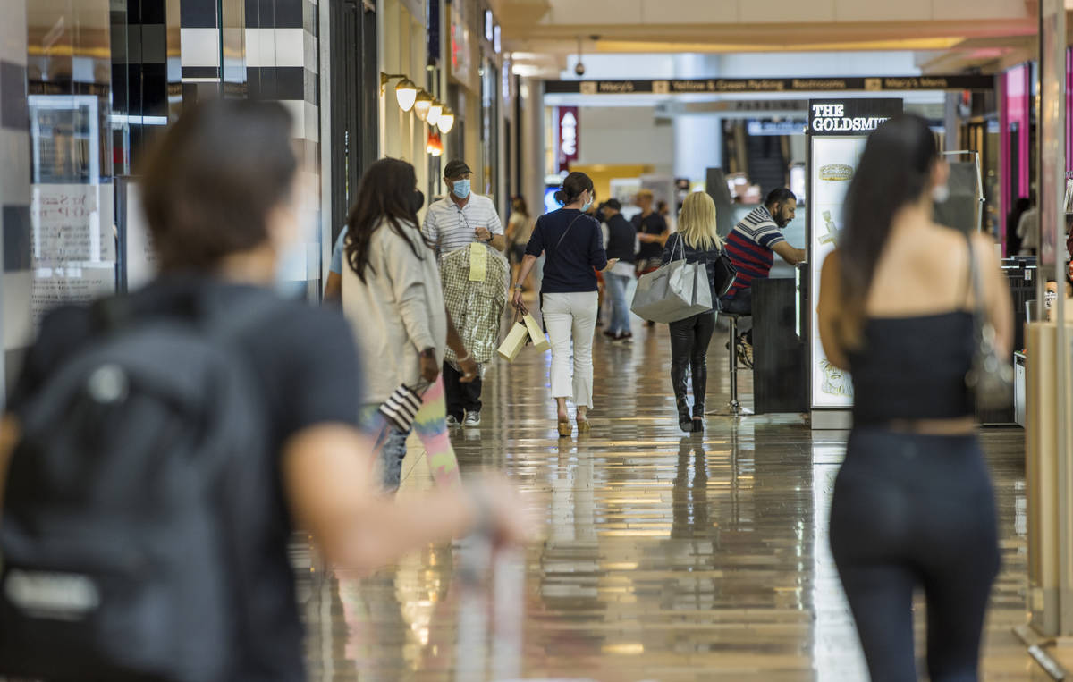 Shoppers make their way about the Fashion Show Mall on Thursday, Oct. 22, 2020, in Las Vegas. M ...